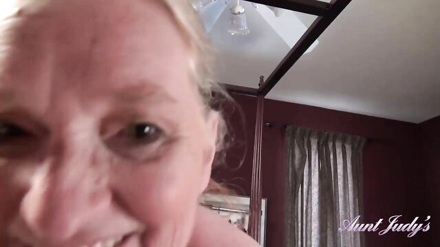 Video features a mature stepmom with big natural tits